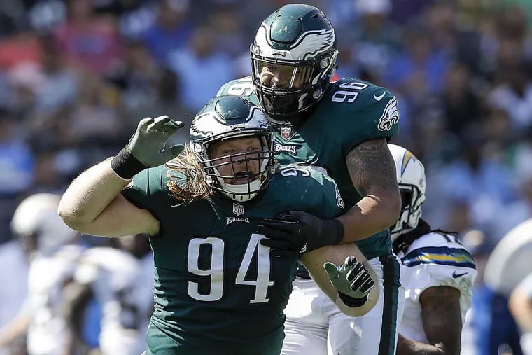 Eagles defensive tackle Beau Allen celebrates a sack with teammate Derek Barnett against the Los Angeles Chargers.