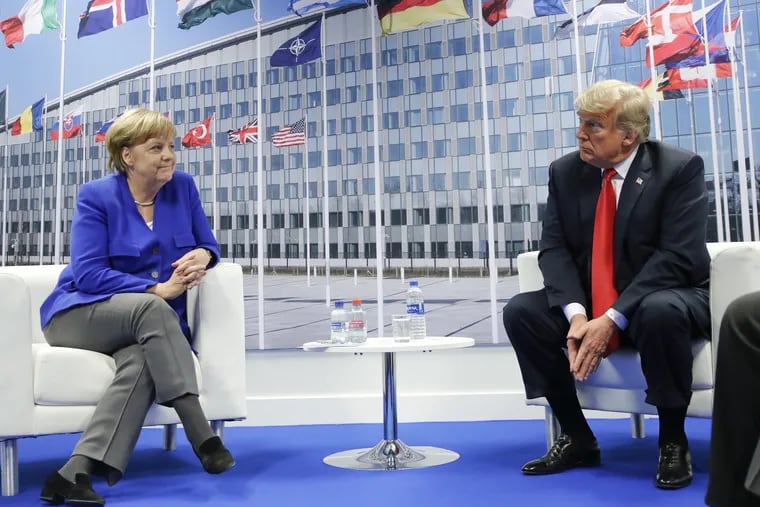 President Donald Trump and German Chancellor Angela Merkel during their bilateral meeting, Wednesday, July 11, 2018 in Brussels, Belgium.