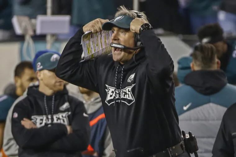 Philadelphia Eagles head coach Doug Pederson gestures toward his players from the sideline during Sunday’s NFC championship game against the Minnesota Vikings.