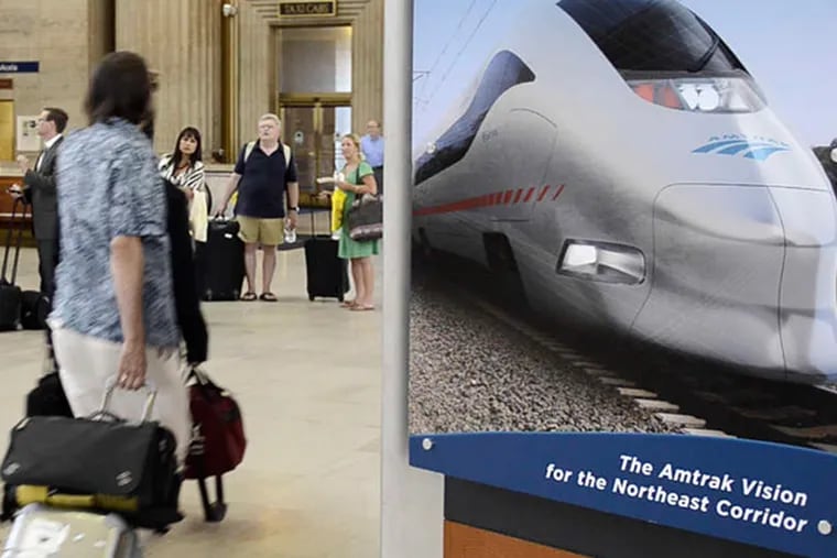 An Amtrak ad at Philadelphia's 30th Street Station proposed what high-speed rail experts are saying: Philadelphia would be a great hub for a new high-speed rail line. ( File )