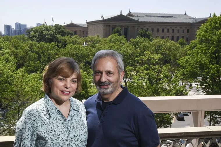 Maryanne Schiller and John Attanasio, on the balcony of their supersized home at the Philadelphian, overlooking the Philadelphia Museum of Art.