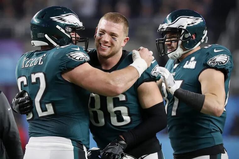 Eagles center Jason Kelce celebrates with Eagles tight end Zach Ertz after Ertz scored the game-winning touchdown in the fourth quarter of Super Bowl LII, at U.S. Bank Stadium in Minneapolis, Minnesota, Sunday, Feb. 4, 2018. The Eagles won 41-33. TIM TAI / Staff Photographer