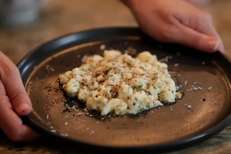 Ricotta gnocchi with black truffle and sourdough made by Alison Steele following Nick Elmi's recipe.