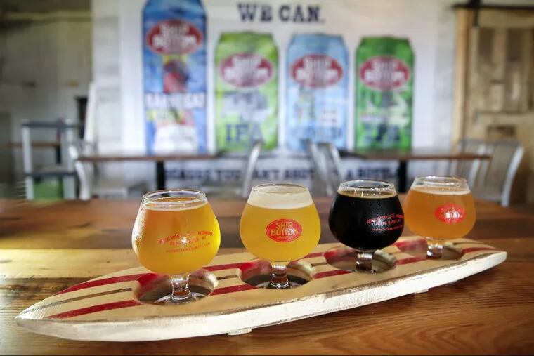 A surfboard flight at Ship Bottom Brewery in Beach Haven offers (from left)  the Cerveza del Playa, Hefe-Nitro, Barnacle Bottom Stout, Stupid Paddle Boat.