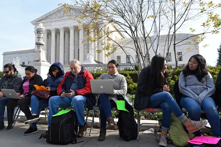 People wait in line outside the Supreme Court in Washington, Monday, Nov. 11, 2019, to be able to attend oral arguments in the case of President Donald Trump's decision to end the Obama-era, Deferred Action for Childhood Arrivals program (DACA). (AP Photo/Susan Walsh)