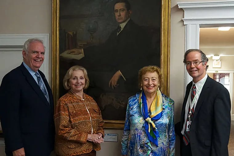At the the Infoage Science History Museum (from left) museum chair Mike Ruane, Monmouth County Clerk Claire French, Princess Elettra Marconi Giovanelli, and museum director Fred Carl, with a painting of physicist and inventor Guglielmo Marconi, the princess' father. (Dave Sica)