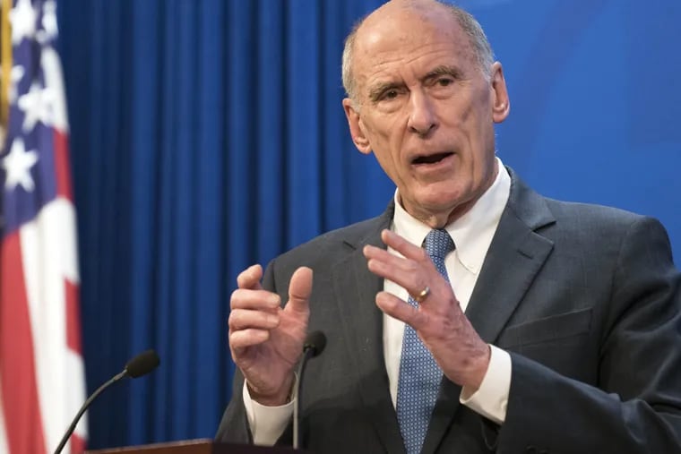 FILE – In this Oct. 13, 2017, file photo, Director of National Intelligence Dan Coats speaks at a Heritage Foundation event in Washington. Coats' drumbeat of criticism against Russia is clashing loudly with President Donald Trump's pro-Kremlin remarks, leaving the soft-spoken spy chief in an uncomfortable _ and perhaps perilous _ seat in the administration. (AP Photo/Kevin Wolf, File)