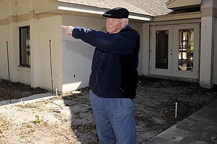 Philadelphia Phillies manager Charlie Manuel walks around his home in Winter Haven, FL. (Preston Mack / Staff)