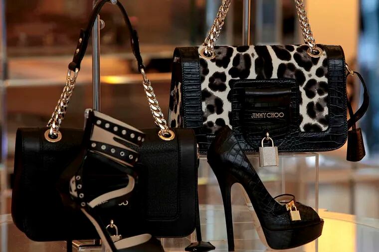 Shoes and handbags at a Jimmy Choo Ltd. store in London. Jimmy Choo plans an initial public offering in London next month as larger luxury companies confront slumping demand in Asia.