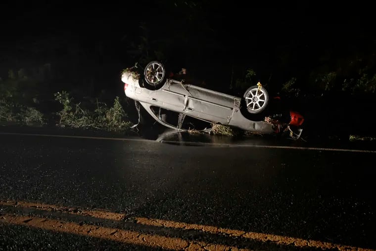 This overturned car was swept up in flooding that occurred on Washington Crossing Rd., near Houghs Creek, in the Washington Crossing/Newtown, Pa. area on Sat. July 15, 2023.