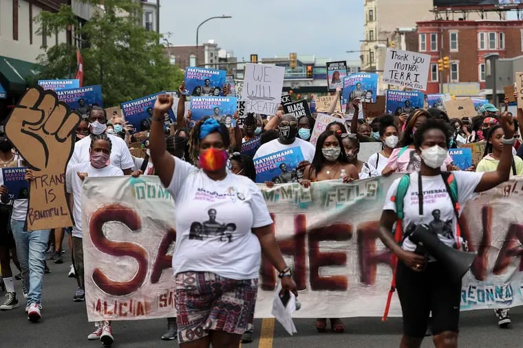 Protesters march through West Philadelphia in honor of Breonna Taylor, Dominique "Rem'mie" Fells and other Black women victims of violence on Saturday, June 20, 2020. Taylor, an EMT, was shot and killed by Louisville, Ky., police March 13; Fells, a transgender woman, was found murdered along the Schuylkill River on June 8.