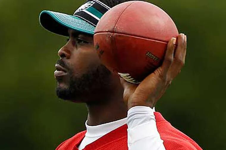 Michael Vick observed Wednesday's afternoon practice but did not participate. (Alex Brandon/AP)