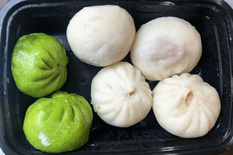 An assortment of steamed buns from Boom Buns in Northeast Philadelphia include pork, beef and vegetable fillings.