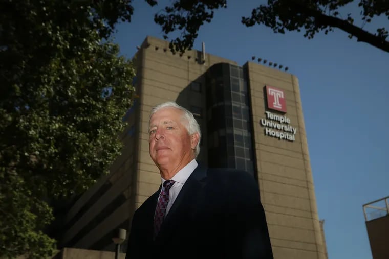 Temple University Health System's new CEO Mike Young poses for a portrait in front of Temple University Hospital in Philadelphia on Sept. 22, 2020.