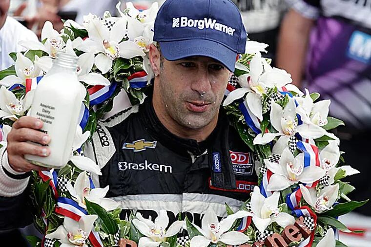 After 12 disappointments, Tony Kanaan finally won the Indianapolis 500 on Sunday. (Michael Conroy/AP)