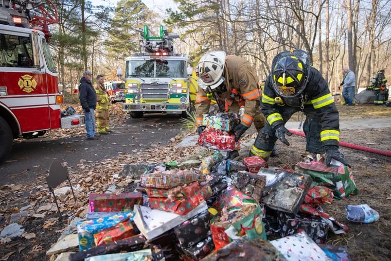 Firefighters were able to locate and remove the family's Christmas presents after the home caught fire in Tabernacle on Christmas Eve. Most of the presents were damaged in the blaze.