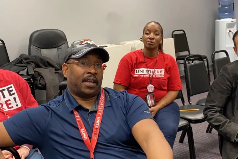 Rodney Mills Jr., a buffet beverage server at Tropicana, talks about why he and other members of Unite Here, Local, 54, are supporting the change in government in Atlantic City.  He is flanked by fellow casino workers Nino Oseria, left, and Felicia Potts, right.