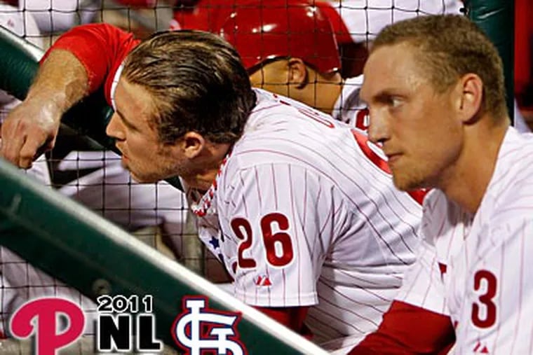 Chase Utley and Hunter Pence look on during the ninth inning of Game 5 on Friday. (Ron Cortes/Staff Photographer)