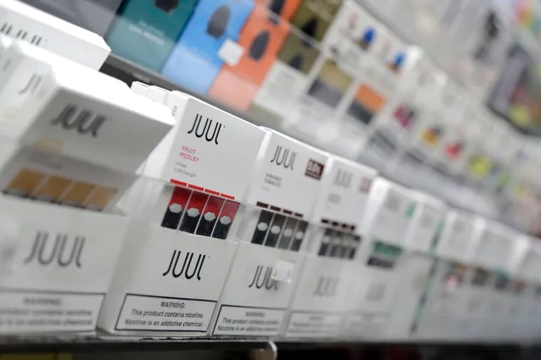 Juul products are displayed at a smoke shop in 2018.