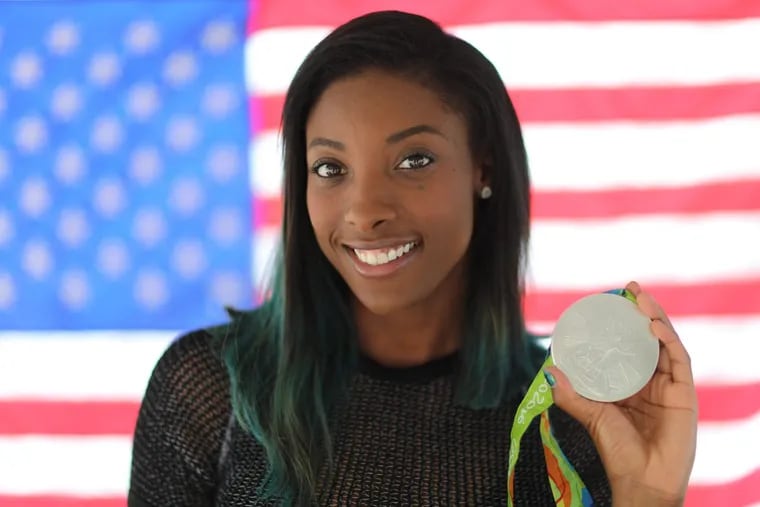Germantown’s Nia Ali won a silver medal at the Rio Olympics in 2016.