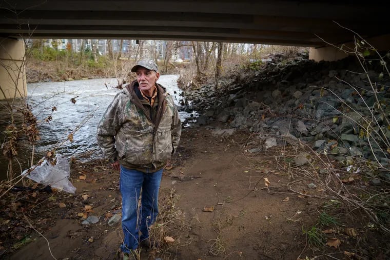 Joseph Giron, 63, a formerly homeless veteran who experienced firsthand the lack of affordable housing in Phoenixville, is shown here near the river where he lived outdoors under a bridge when he was homeless, in Phoenixville, November 27, 2018.