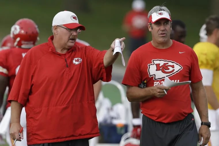 Eagles coach Doug Pederson (right) — a one-time assistant at Kansas City — was mentored by Chiefs coach Andy Reid.