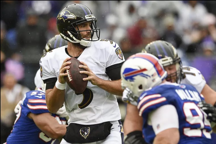 Baltimore Ravens quarterback Joe Flacco (5) looks for an open man during the first half of an NFL football game against the Buffalo Bills, Sunday, Sept. 9, 2018, in Baltimore. (AP Photo/Nick Wass)