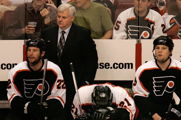 Ken Hitchcock (background) came within a game of the Stanley Cup Final as coach of the Flyers in the mid-2000s.