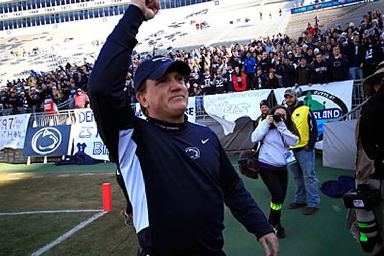 Interim coach Tom Bradley greets fans before Penn State's game against Nebraska. (David Swanson/Staff Photographer)