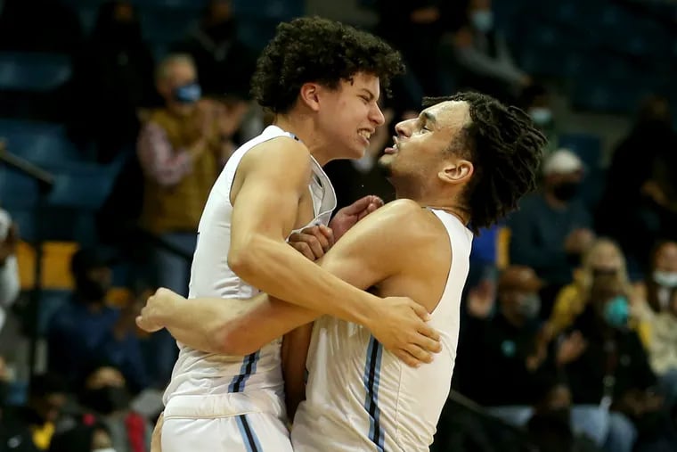 Westtown boys basketball player Dereck Lively II, right, is one of  the top boys players in the country in the senior class  and is headed to Duke.  Diego Uribe, left, leaps into his arms after their team won the Friends Schools League Basketball Championships against Academy of the New Church on Feb. 18, 2022.