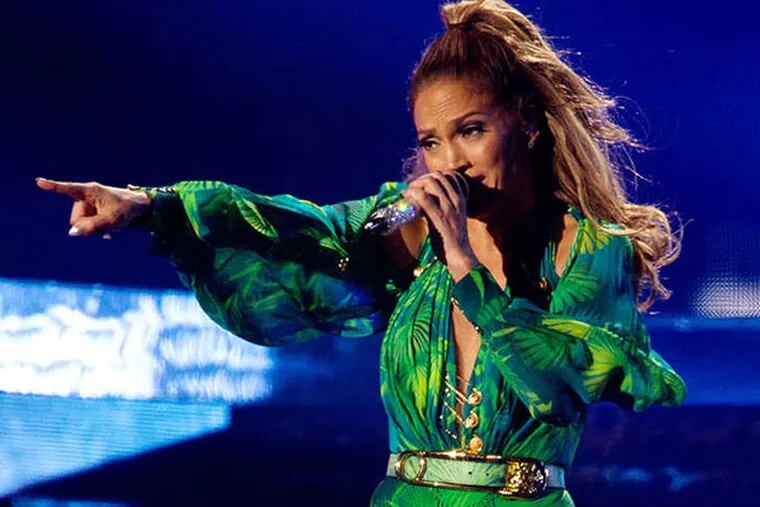 Jennifer Lopez won't be singing, dancing or looking like this when she stars as a single-mom cop in a new TV series. KRISTINA BUMPHREY / ASSOCIATED PRESS