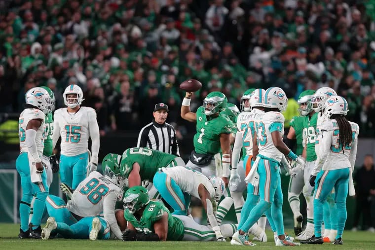 Quarterback Jalen Hurts (1) gained 2 yards after the Eagles went for it on fourth-and-1 in the fourth quarter against the Miami Dolphins. The Brotherly Shove worked again.