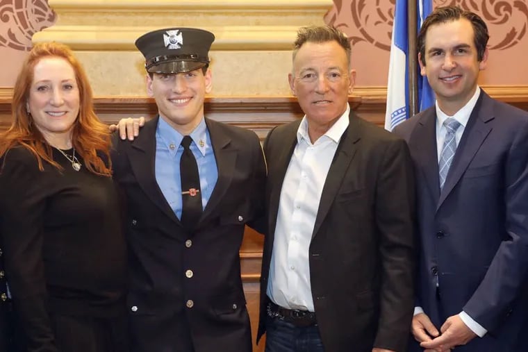 Jersey City's Mayor Steven Fulop shared this image from the swearing in ceremony of Sam Springsteen as new Jersey City firefighter. From left are Patti Scialfa, Sam and Bruce Springsteen and the mayor Steven Fulop.