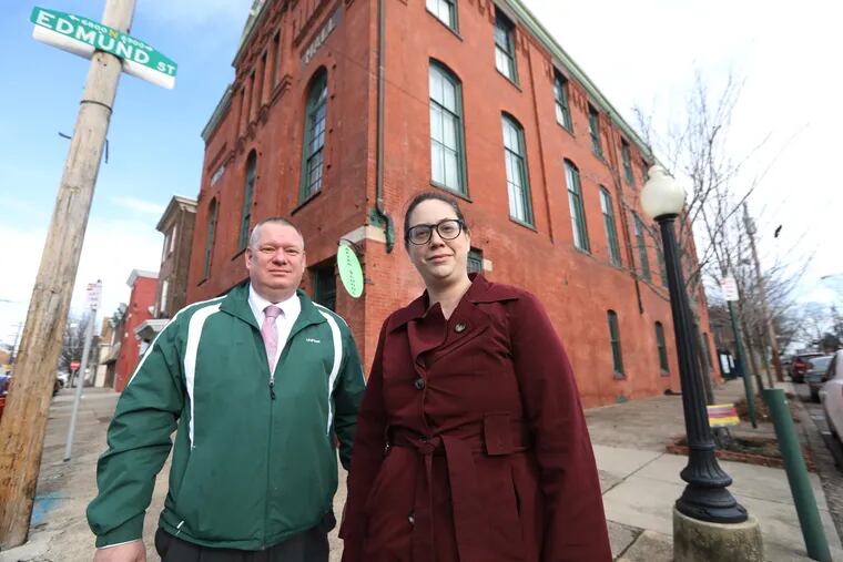 Deborah Hinchey and Pete Smith in front of the Tacony Music Hall where Hinchey runs a sex-positive club, which neighbors fought fiercely against last year. Smith, the new head of the Civic, has helped make the peace between neighbors and the club. December 17, 2018 DAVID SWANSON / Staff Photographer .