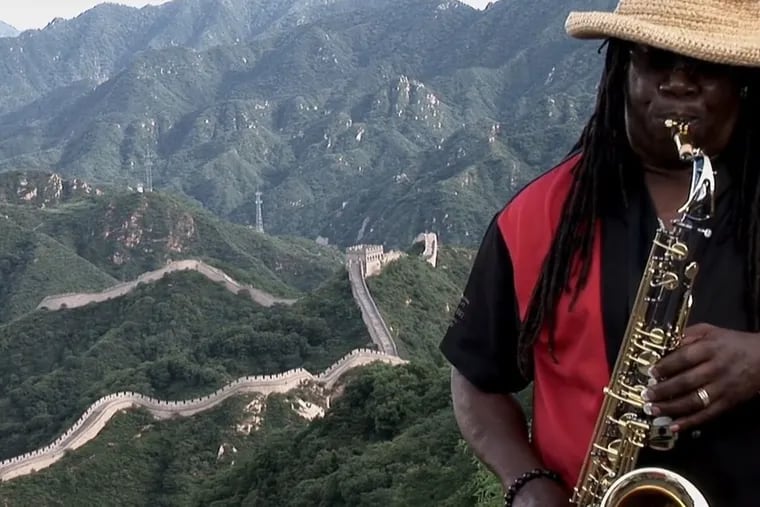 Clarence Clemons in China in 2005 'Clarence Clemons: Who Do I Think I Am?' The movie screens at the Roxy on Tuesday.