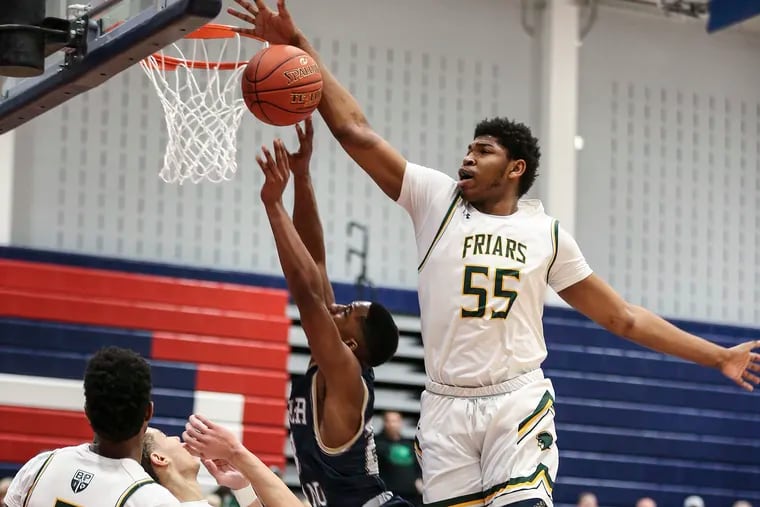 Bonner-Prendergast's Tariq Ingraham blocks the shot of Lower Moreland's Demosthenis Amanatidis during the 2nd quarter of the PIAA Class 4A semi-finals state playoffs in Plymouth Meeting, Pa., Monday, March 18, 2019. Bonner-Prendergast beat Lower Moreland, 83-47, to advance to the State Championship game.
