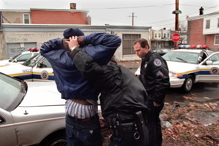 Philadelphia Police Narcotice Strike officers arrest a suspect in West Philadelphia after witnessing several drug sales on this corner. 1998 