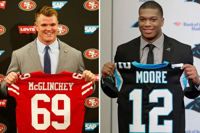 Mike McGlinchey (left) and D.J. Moore are both local products that heard their names called in the first round of the NFL draft on Thursday.