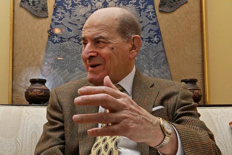 Dr. Henry Heimlich, seen here at his home in 2014, is known for developing the Heimlich maneuver that has been used to clear obstructions from the windpipes of choking victims around the world for four decades.