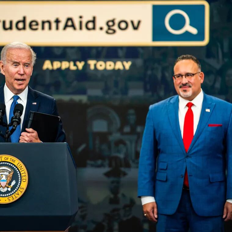 President Biden discusses student loan relief alongside Education Secretary Miguel Cardona in 2022.