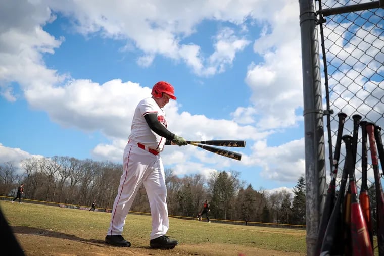 Jim Fullan, 56, who is a member of the Montgomery County Community College baseball team, takes a practice swing during their game in Blue Bell, Pa. on March 5, 2023.