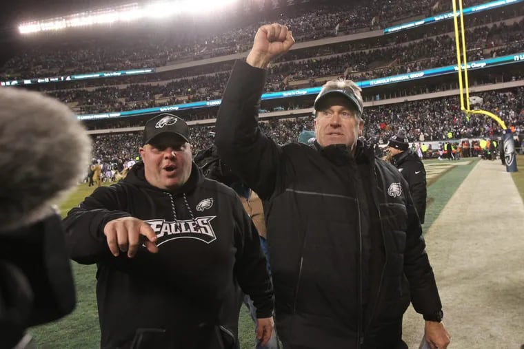 Philadelphia Eagles head coach Doug Pederson salutes the fans at Lincoln Financial Field after the Eagles’ 15-10 playoff win over the Atlanta Falcons.