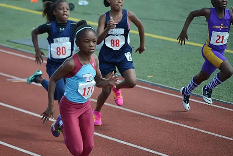 Avery Lewis at the United Age Group Track Coaches Association Youth Invitational in Chester in 2014. Last July, she won the 100- and 200-meter races and the long jump at the Amateur Athletic Union (AAU) Junior Olympics, breaking the AAU long-jump record for her age.