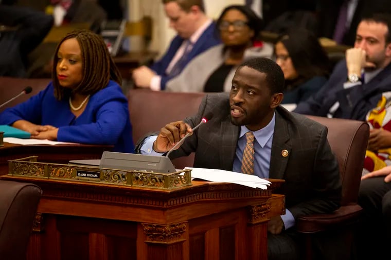 City Councilmember Isaiah Thomas attends his first working meeting in City Hall on Jan. 23.
