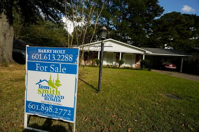 A sign touts a residence for sale in Jackson, Miss.