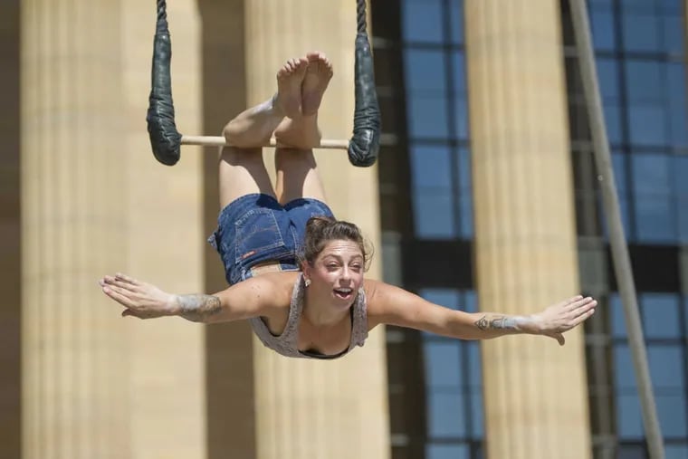 Nicole “Cole” Burgio performs on a trapeze. Burgio said she began gymnastics as a toddler, and performs at festivals and on cruise ships.