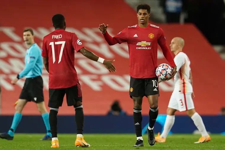 Marcus Rashford (right) scored a hat trick for Manchester United in the UEFA Champions League on Wednesday.