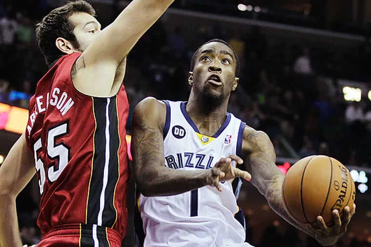 The Sixers have reportedly acquired Grizzlies guard Tony Wroten (right). (Danny Johnston/AP file photo)
