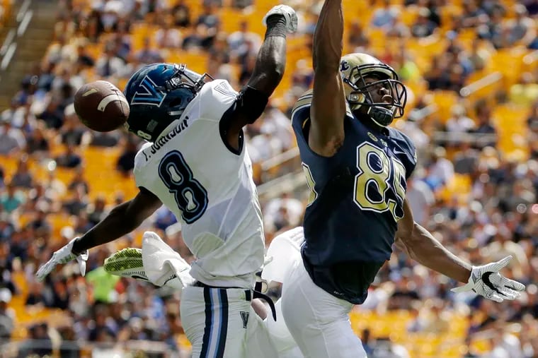 Villanova's Trey Johnson (8) breaks up a pass intended for Pittsburgh's Jester Weah (85) during the first half of an NCAA college football game in Pittsburgh in 2016. Johnson is now suing the NCAA over pay for student-athletes.