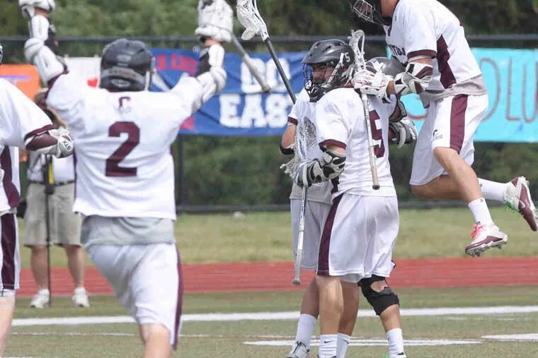 Conestoga celebrates a second-quarter goal against Central Bucks East that gave it a 9-0 lead in the state semifinal. The top-ranked Pioneers are outscoring foes by 11.3 goals in the tourney.